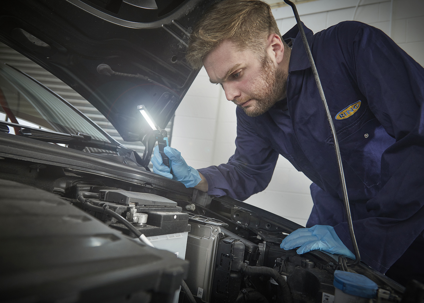 RIL85 Twist & Flex Slim Inspection Lamp under the hood insitu